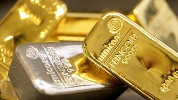 Qızılın qiyməti yenidən 5 000 dolları ötüb